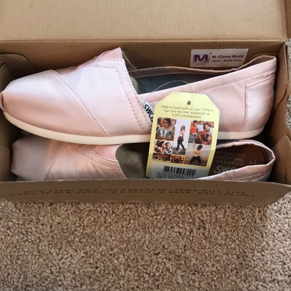 Brand New, Tags still attached Toms.